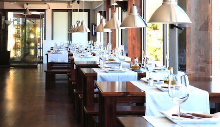 inner vista of modern restaurant whith tables and glass