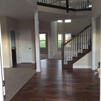 Dark Wood Flooring and Carpeting Throughout House