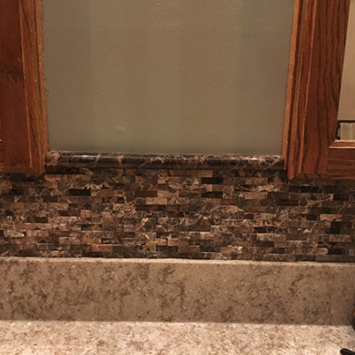 Stone Accent trim above marble countertop - Duncan Flooring Residential Project